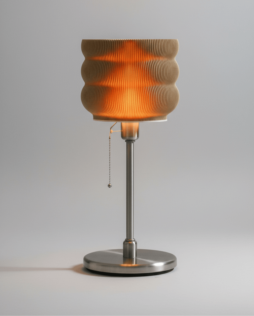 Table lamp with ribbed glass shade on a gray background